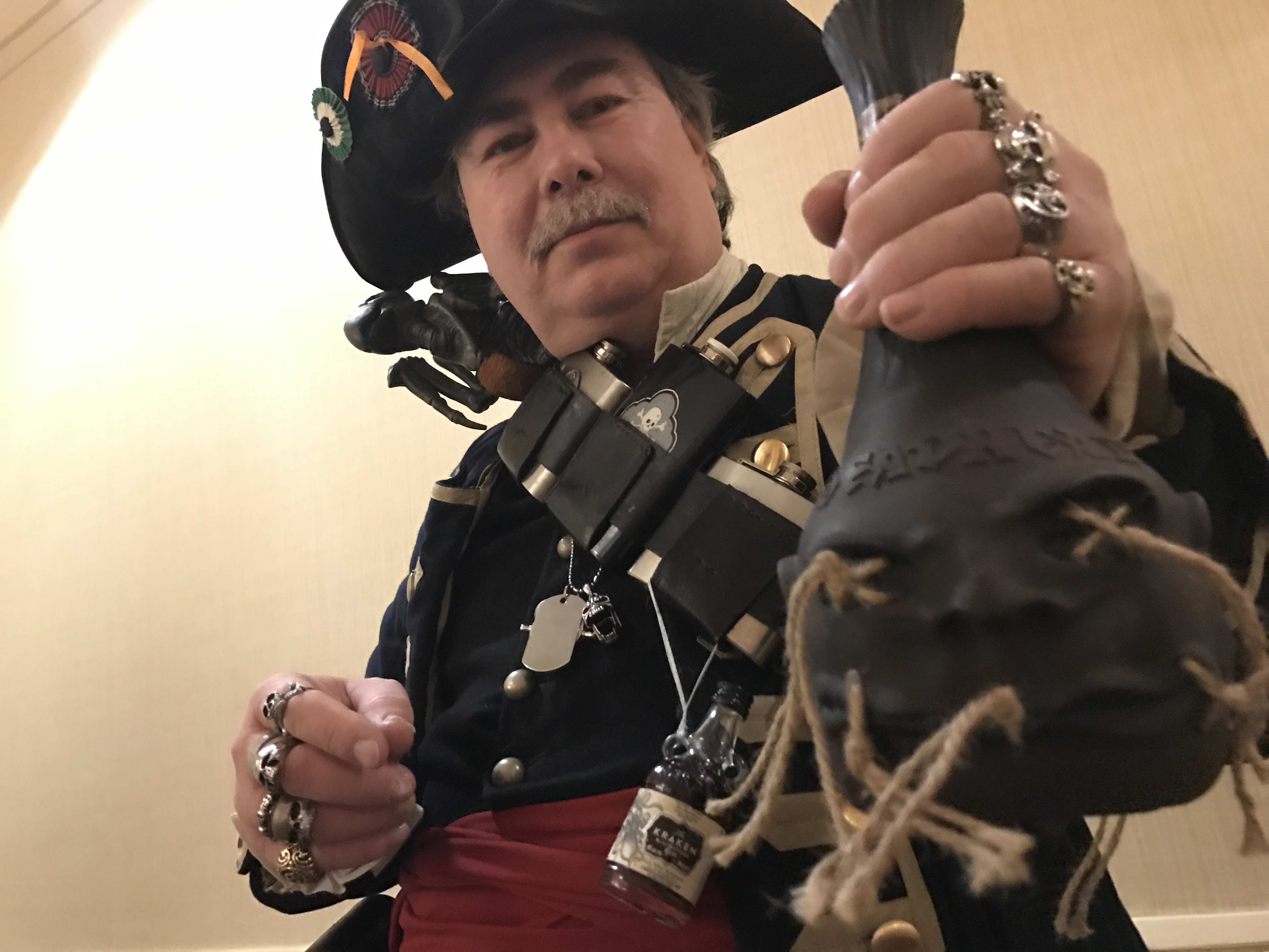 Captain Rumpot with a bottle of Deadhead Rum